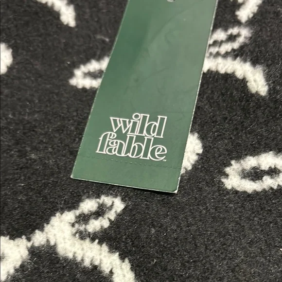 Wilf Fable Black Shorts with White Bow Design - Picture 2 of 5